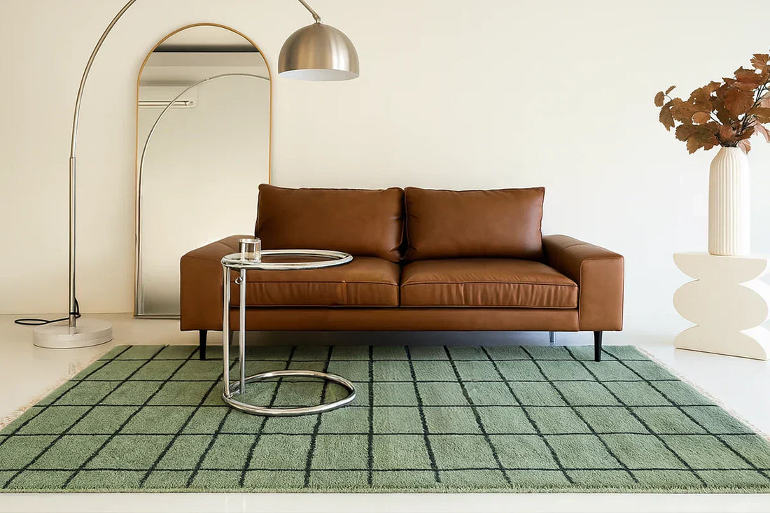 green and black checkered wool area rug in a modern minimalist living room