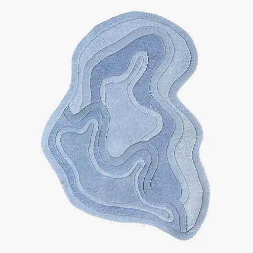 cool blue irregular shaped modern rug with organic flowing lines, hand tufted from wool