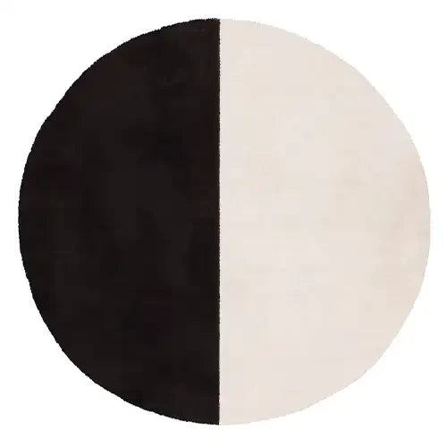 Round 15x15 rug with a minimalist black and white color block pattern