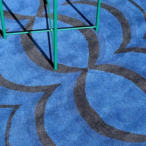 royal blue wavy area rug with scalloped edges and unique funky design