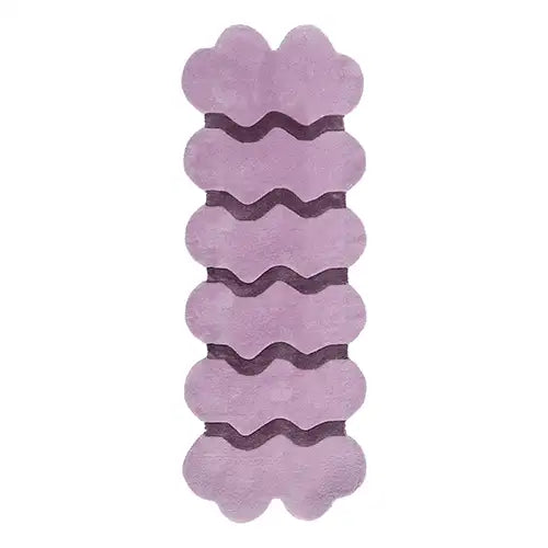 purple runner rug with unique scalloped edges and wavy striped for a playful modern style