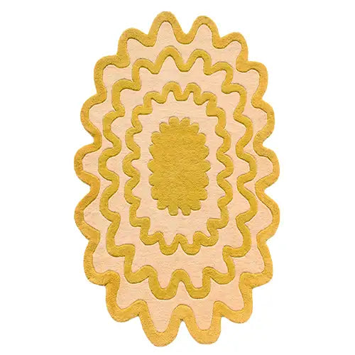 yellow oval rug with funky scalloped wavy design