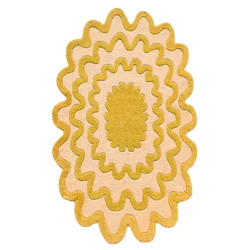 unique yellow oval wool rug with wavy scalloped design
