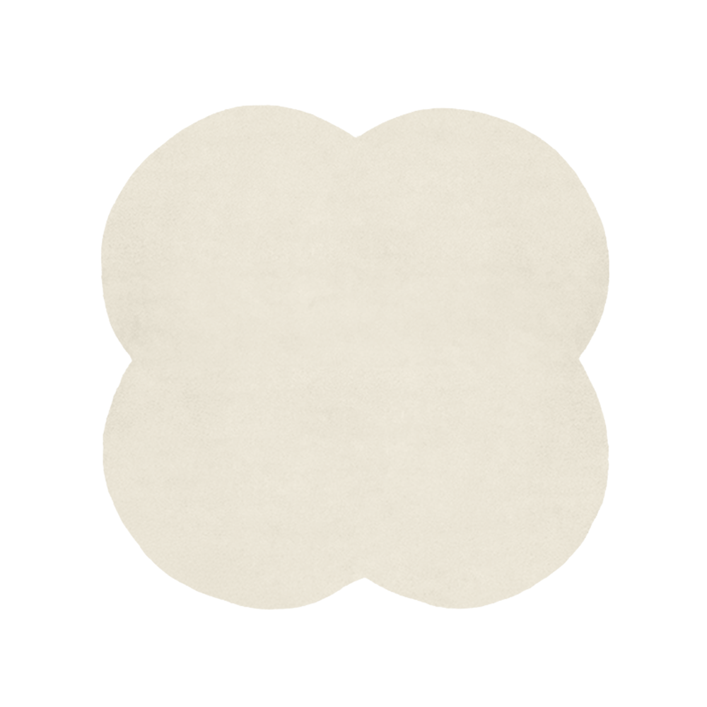 Beige four-leaf clover-shaped rug on a white background