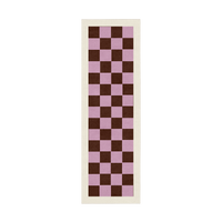 Checkered rug with brown and pink squares on a white background