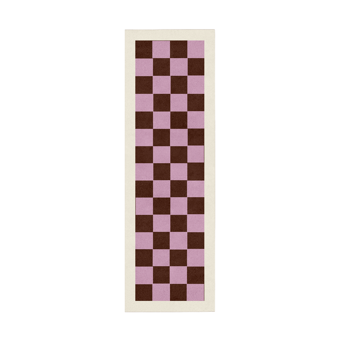 Checkered rug with brown and pink squares on a white background