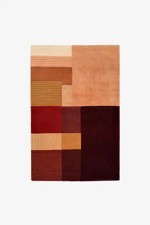 4x6 rug with a patchwork design in shades of brown and red on a white background