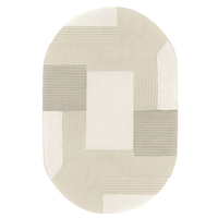 Neutral cream oval wool rug with sculpted texture and subtle modern geometric color blocks