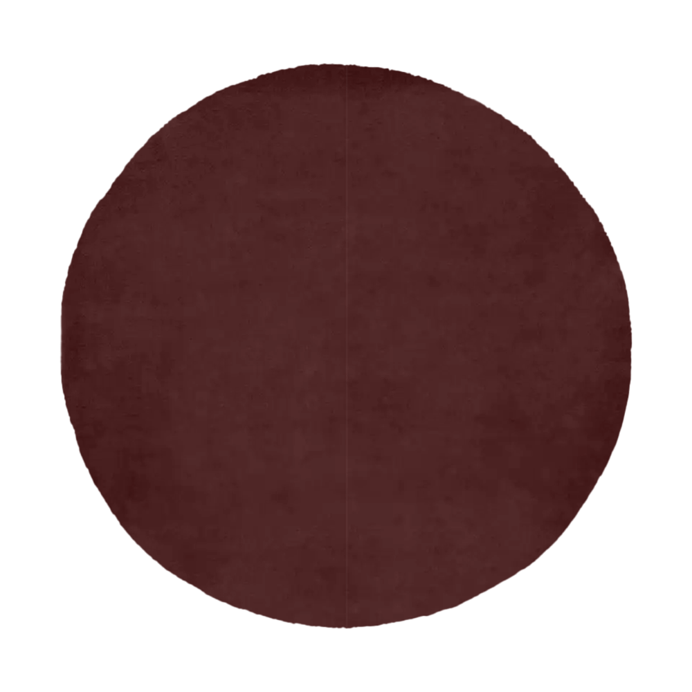 warm brown round wool rug