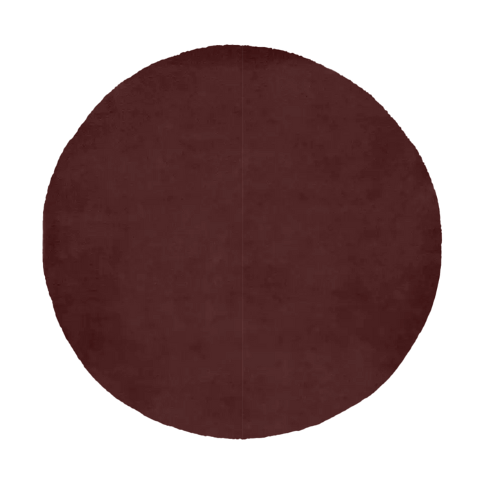 warm brown round wool rug