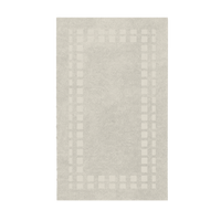 Rectangular area rug with a subtle pattern on a plain background