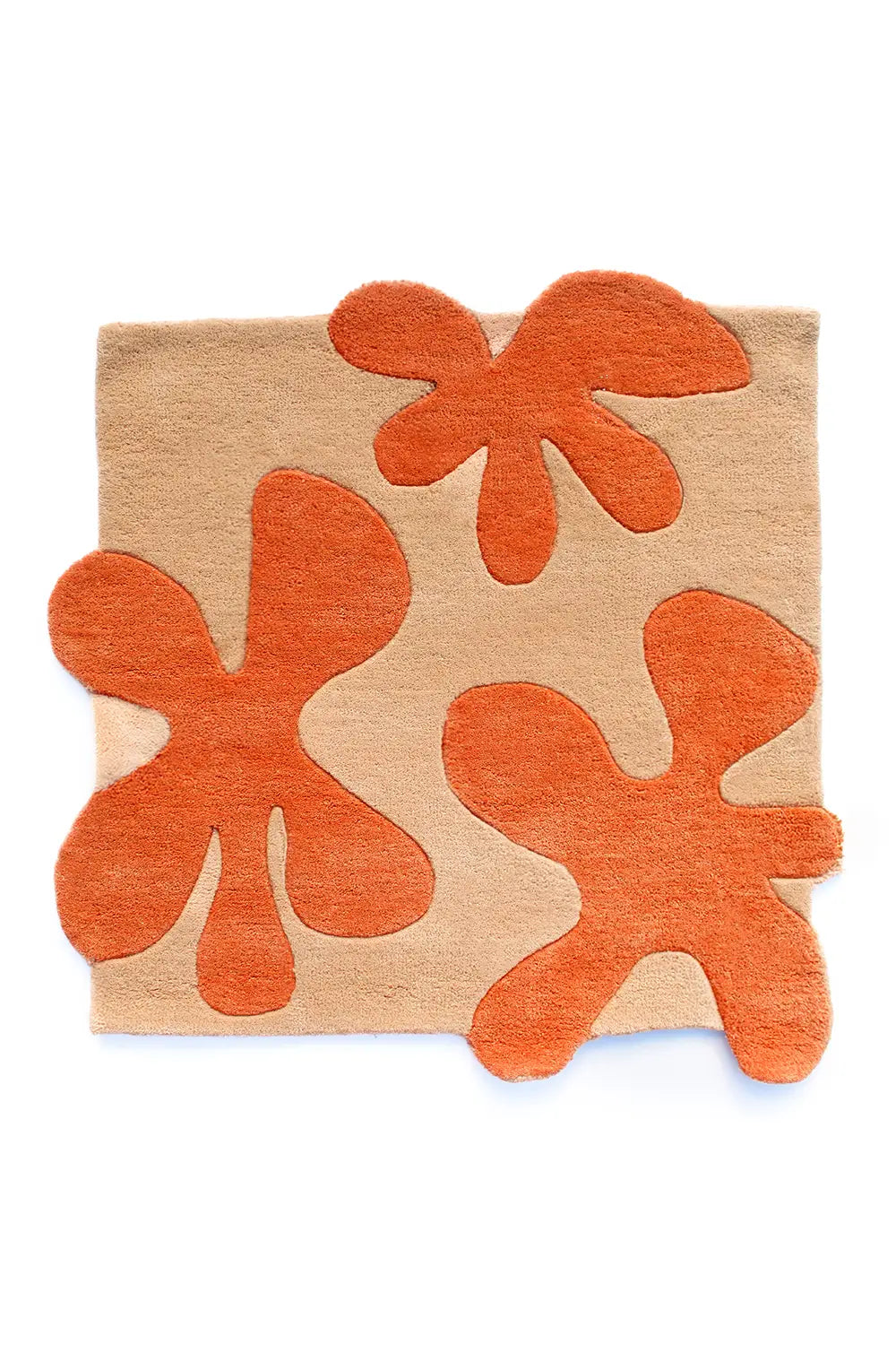 A sculpted 3D flower rug designed to bring organic texture to modern spaces