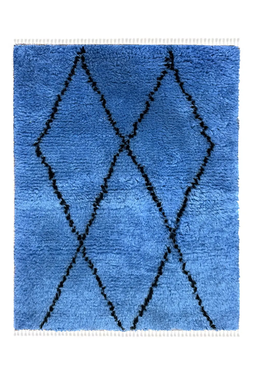 Flatlay of Blue Diamond Geometric Shag Wool Rug with a plush, high-pile texture