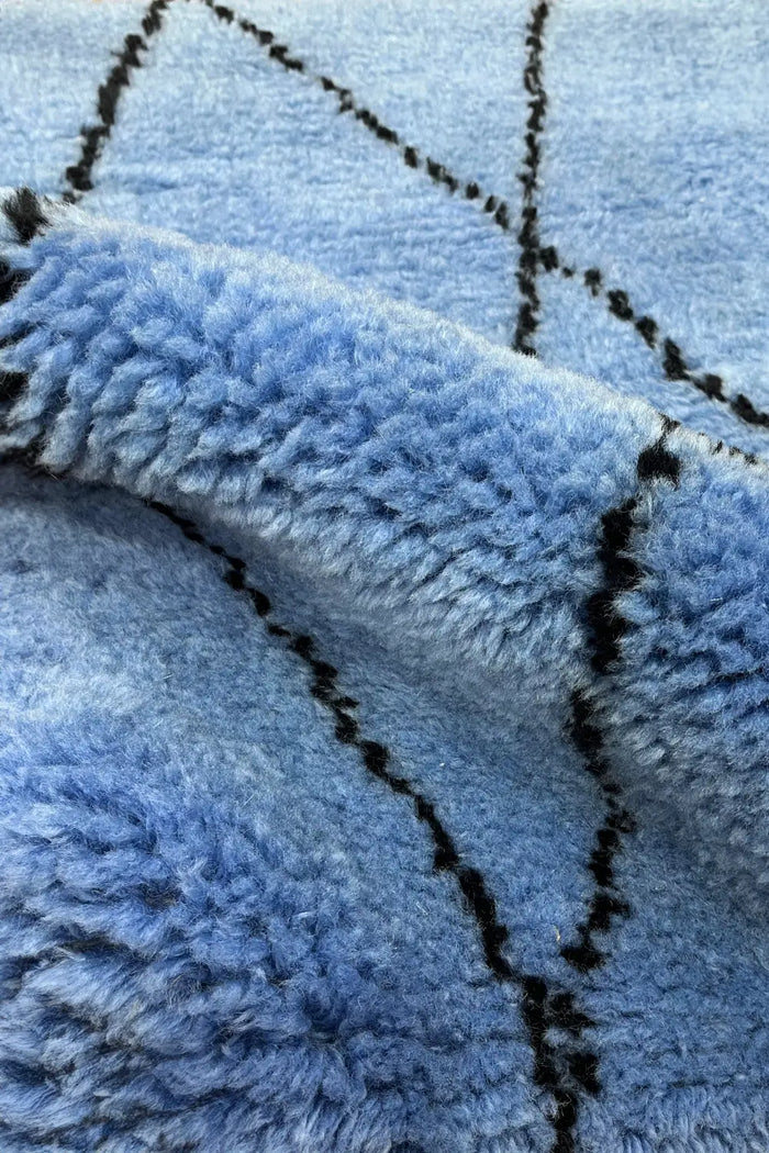 Sky blue shag rug with black diamond motif, funky colorful area rug for modern bedrooms and relaxed living spaces