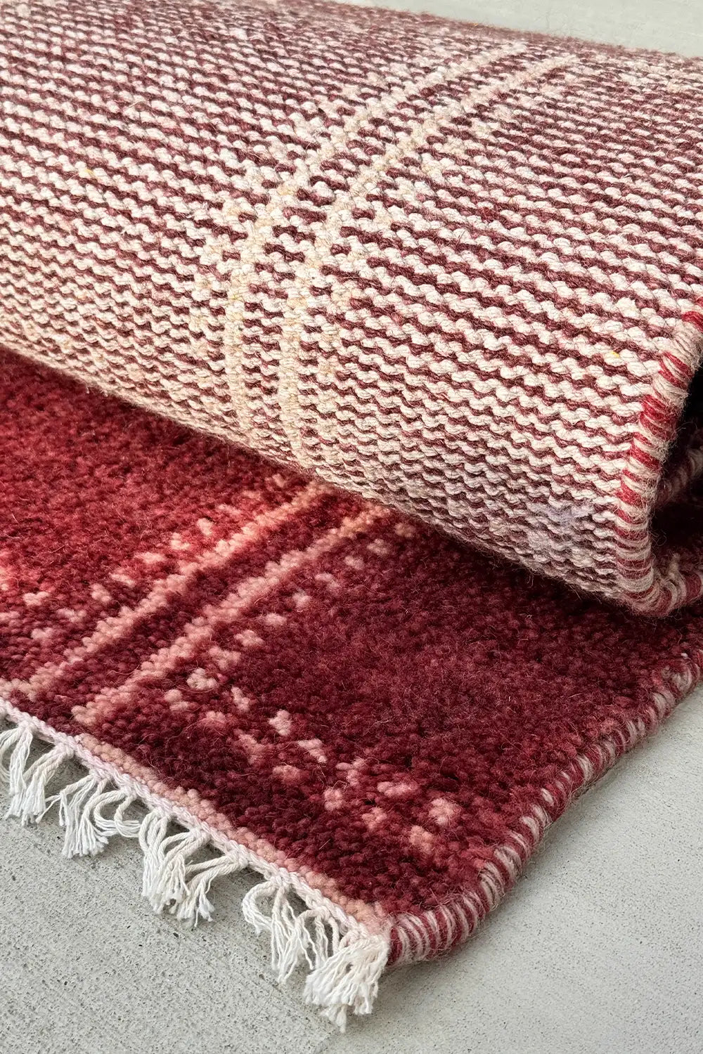 deep red graphic wool area rug with modern geometric design