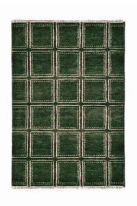 Green geometric area rug with a modern square pattern