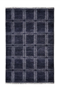 Blue geometric rug with square pattern hand knotted from luxurious wool