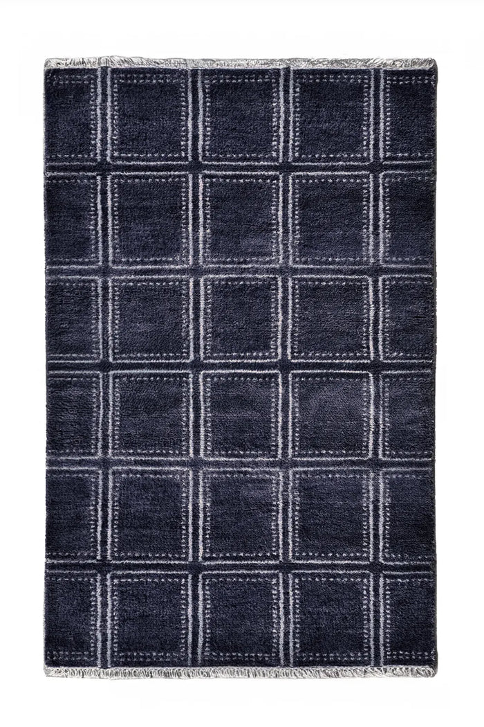 Blue geometric rug with square pattern hand knotted from luxurious wool