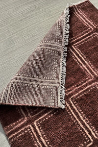 Brown patterned wool rug perfect for styling with modern and traditional furnishings