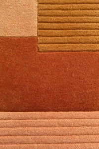 Hand-tufted wool rug in soft neutral earth tones with ridge details