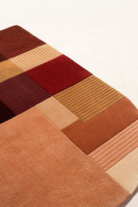 4x6 wool area rug with arch silhouette and earth toned color block pattern for modern interiors