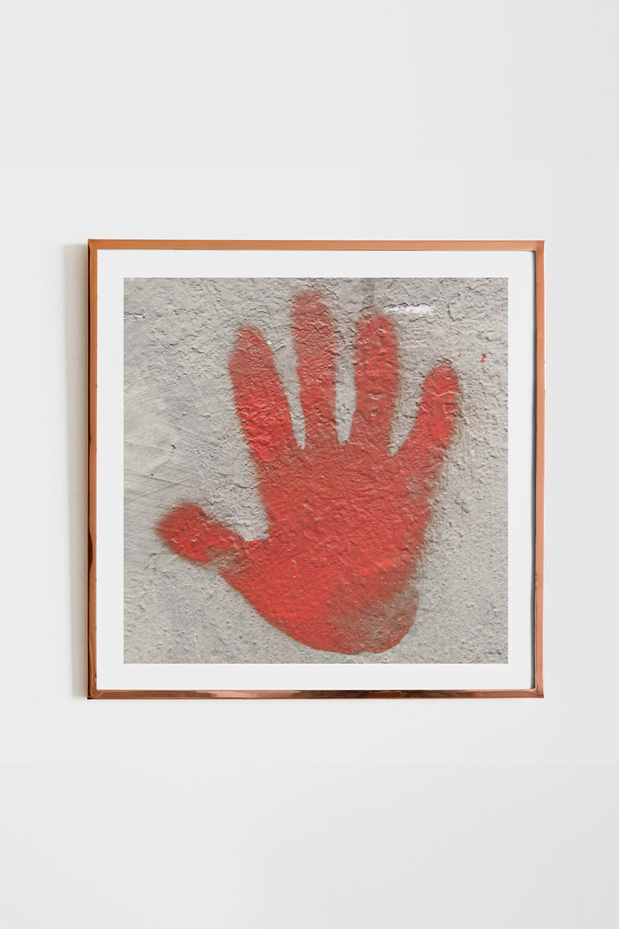 Square giclée art print of a striking red hand print on a cement wall, printed on premium semi-gloss paper.