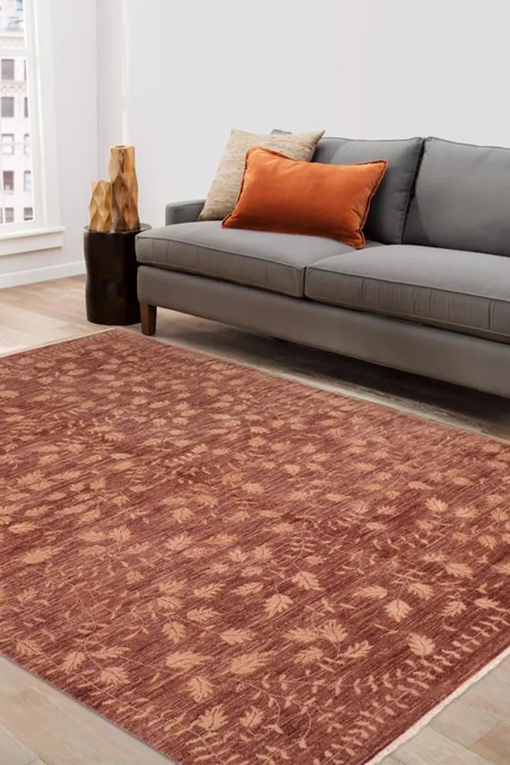 Low-pile brown wool rug, combining traditional techniques with modern style.