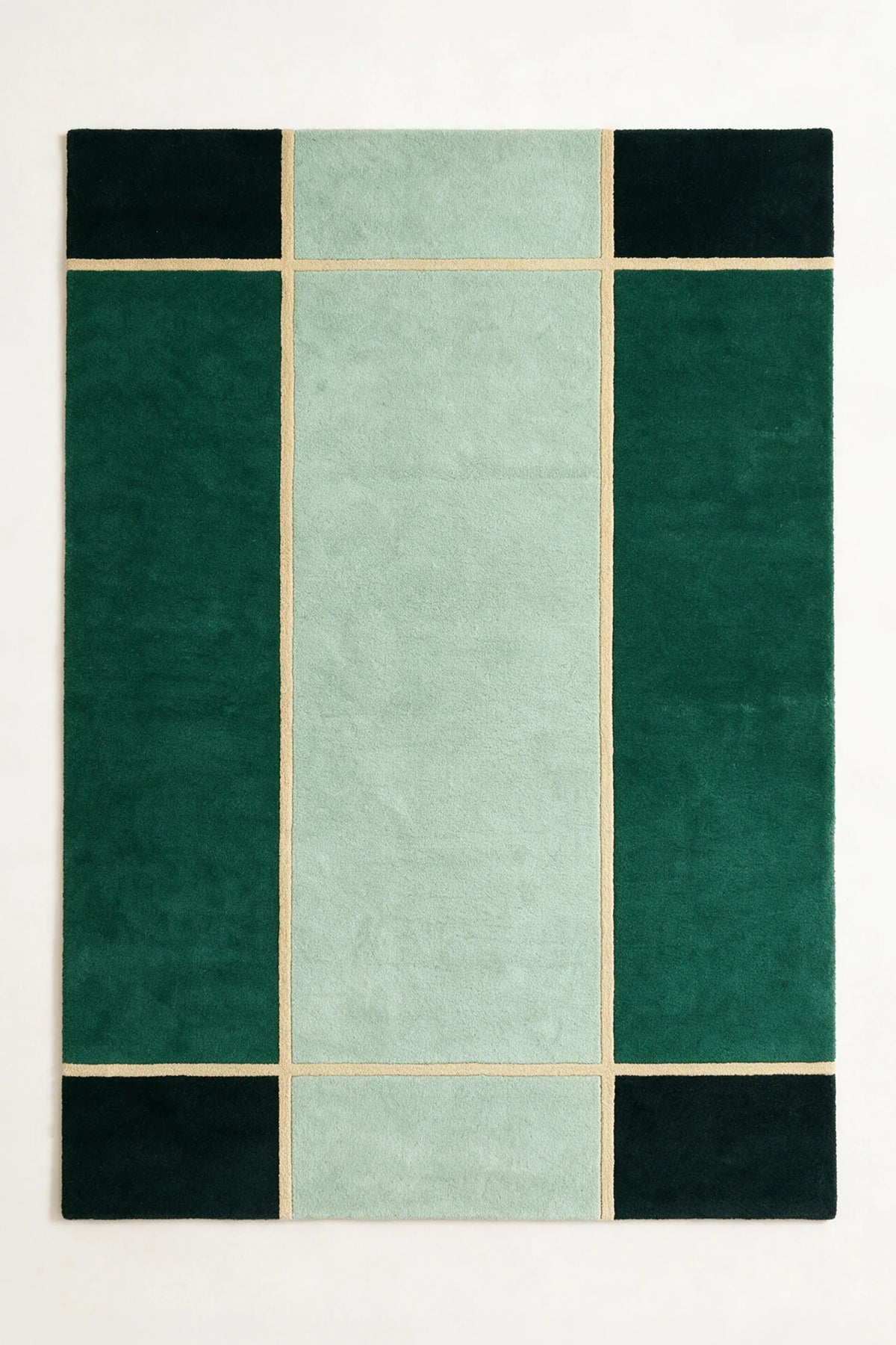 a axis hand-tufted wool rug in forest, mist, pine and soft yellow, shown flat from above