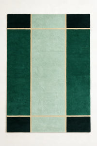 a axis hand-tufted wool rug in forest, mist, pine and soft yellow, shown flat from above