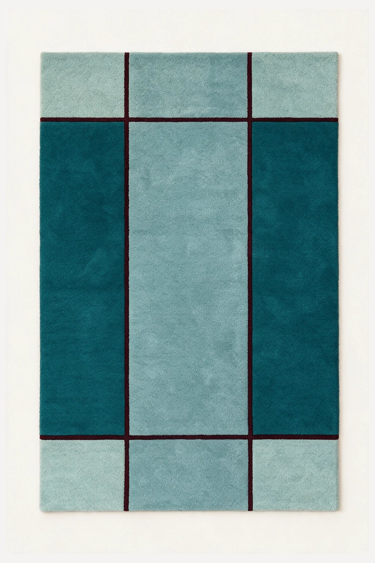 a axis hand-tufted wool rug in seafoam, spruce, teal and wine, shown flat from above