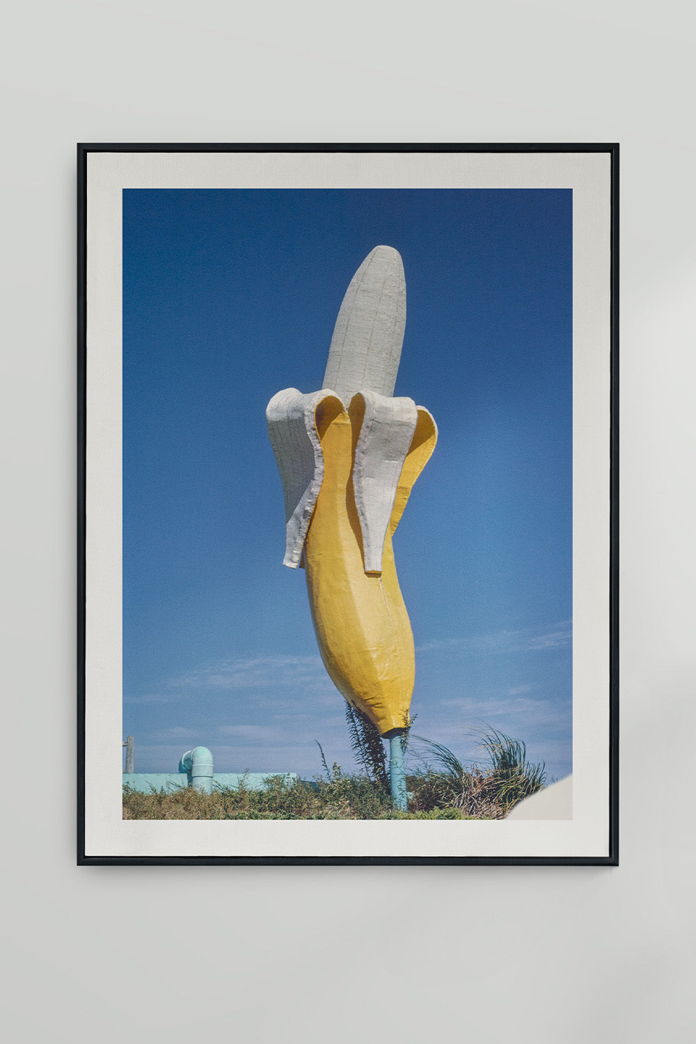 John Margolies' photograph of Banana Waterslide roadside attraction with bright blue sky.