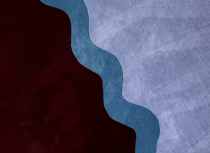 Abstract rug with wavy lines in brown, dark and light blue on a textured background
