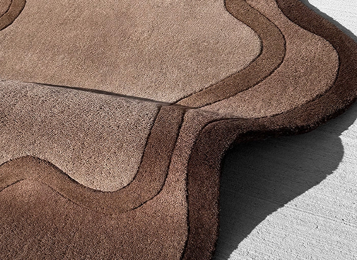 Brown wavy rug on a light gray floor