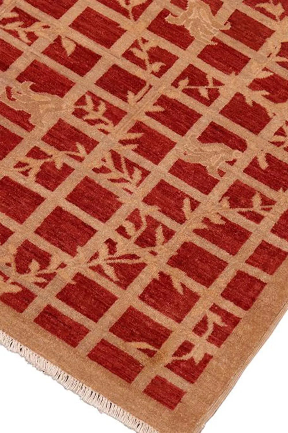 Low pile wool rug in a warm red and brown colorway, blending classic and contemporary.
