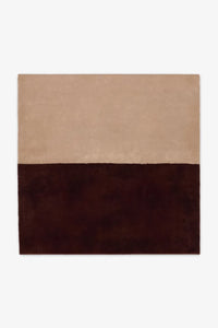 Warm tan and chocolate brown wool square rug in 8 ft square size, fitting beautifully into mid-century modern dining rooms, organic modern spaces, or earthy neutral bedrooms hazelnut