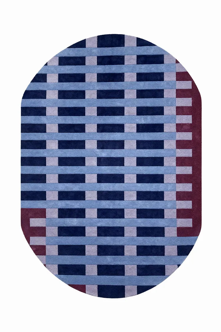 custom oval-shaped rug with a blue and red checkered pattern on a white background