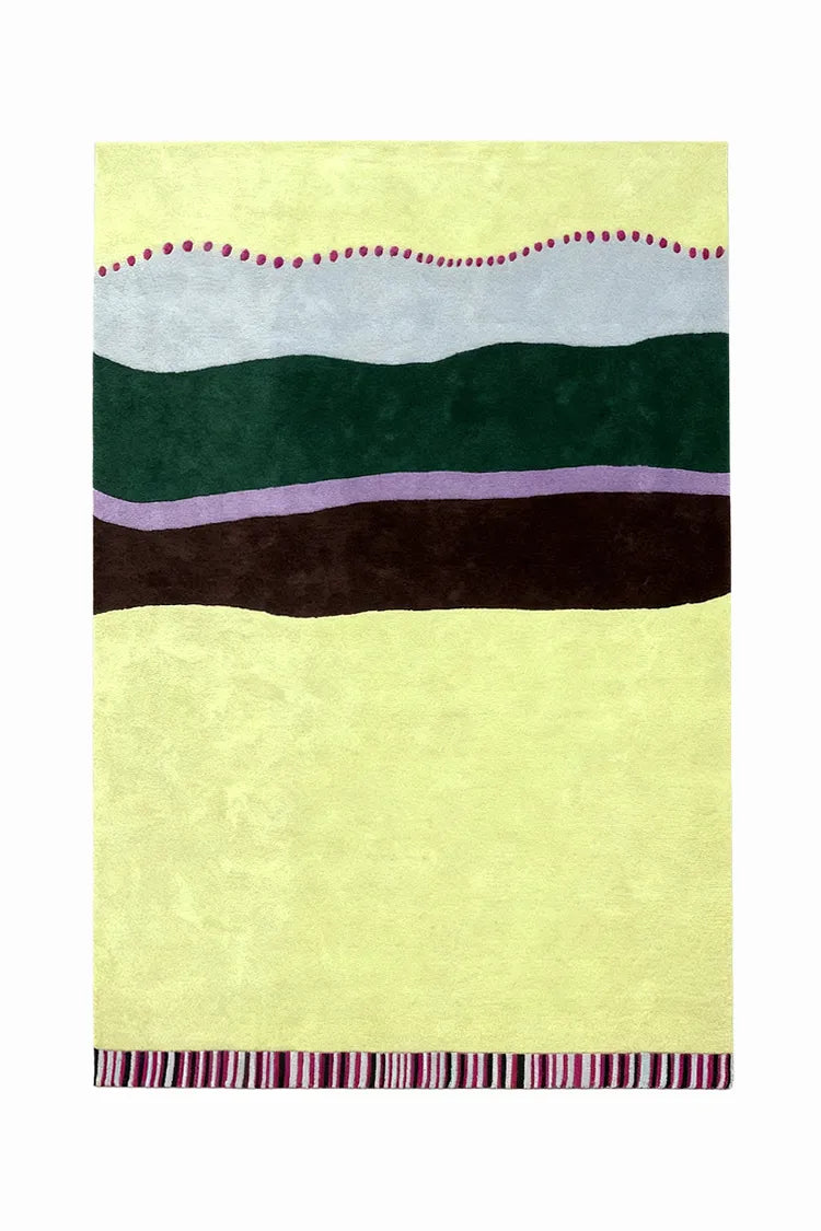 custom striped rug with green, purple, and black bands on a yellow background