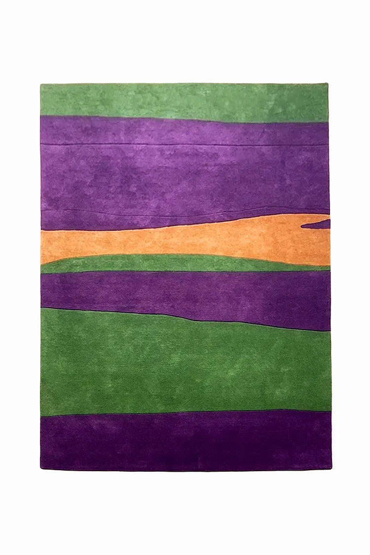 Colorful striped custom rug with purple, green, and orange on a white background