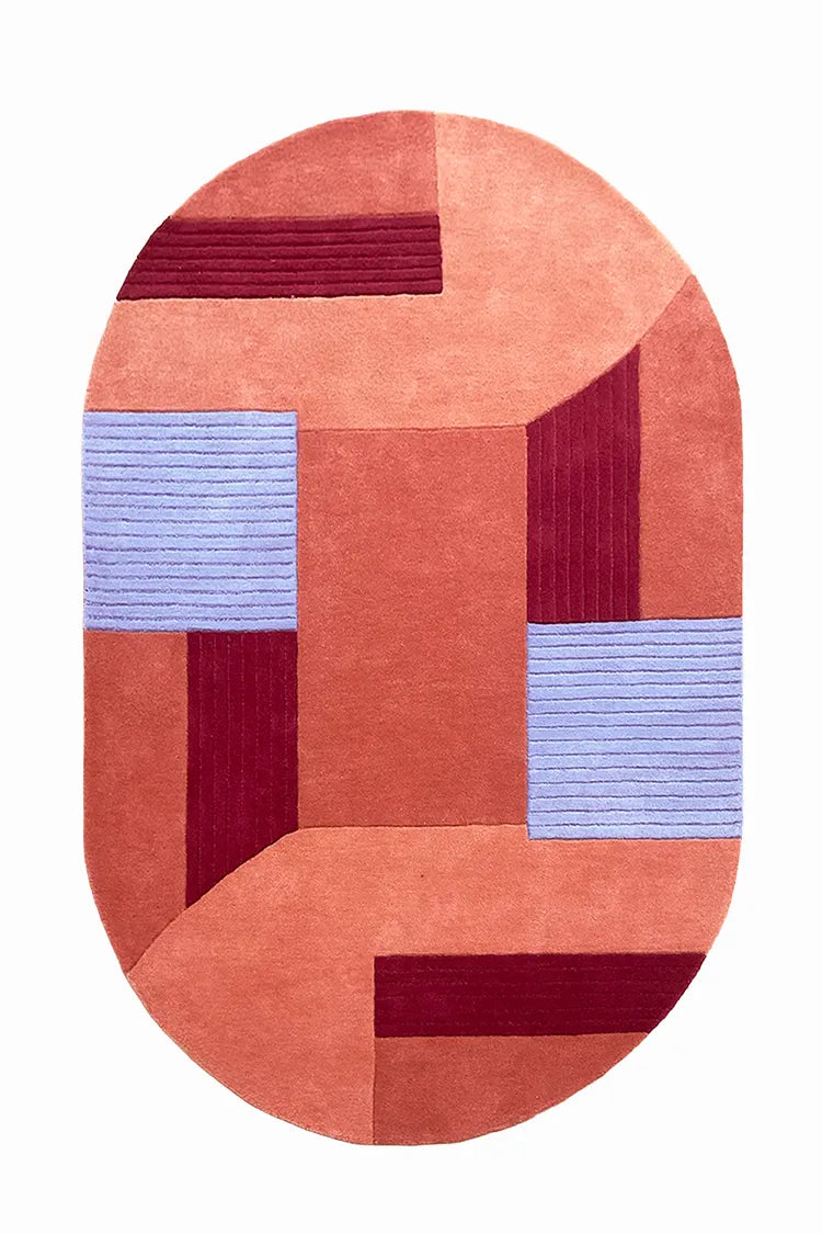 custom oval rug with red and blue colors on a white background