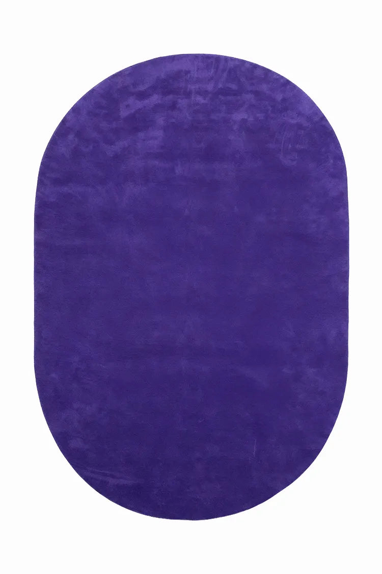 Purple oval rug on a white background