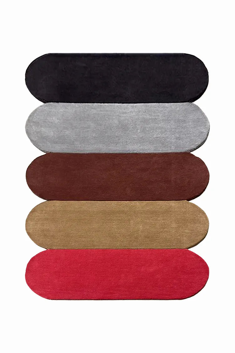 custom scalloped rugs in black, gray, brown, beige, and red on a white background
