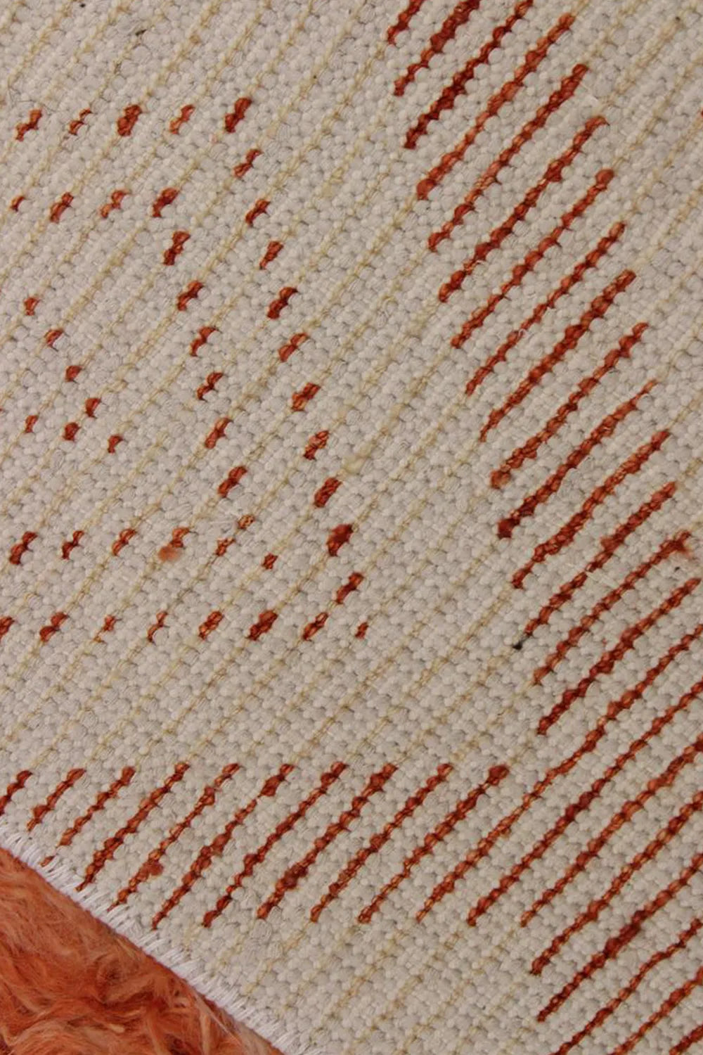 View of the handwoven wool backing showing artisan craftsmanship and sturdy construction for a durable custom wool rug