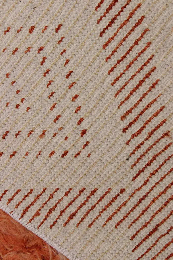 View of the handwoven wool backing showing artisan craftsmanship and sturdy construction for a durable custom wool rug