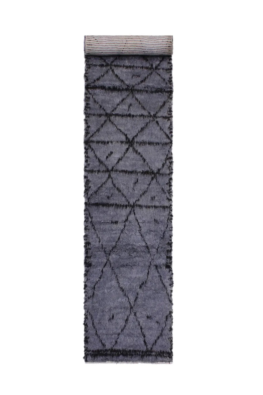 Dark gray wool runner rug with a shag pile, perfect for adding warmth to hallways.