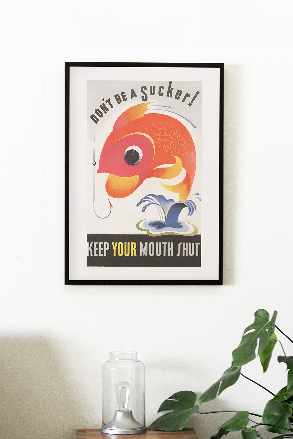 Vintage poster art print of an orange fish beside a hook with playful text warnings.