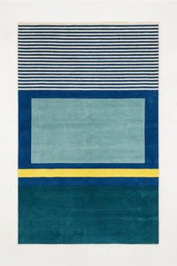 a fieldwork hand-tufted wool rug in ocean, teal, oat and mustard, shown flat from above