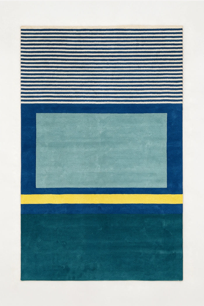 a fieldwork hand-tufted wool rug in ocean, teal, oat and mustard, shown flat from above