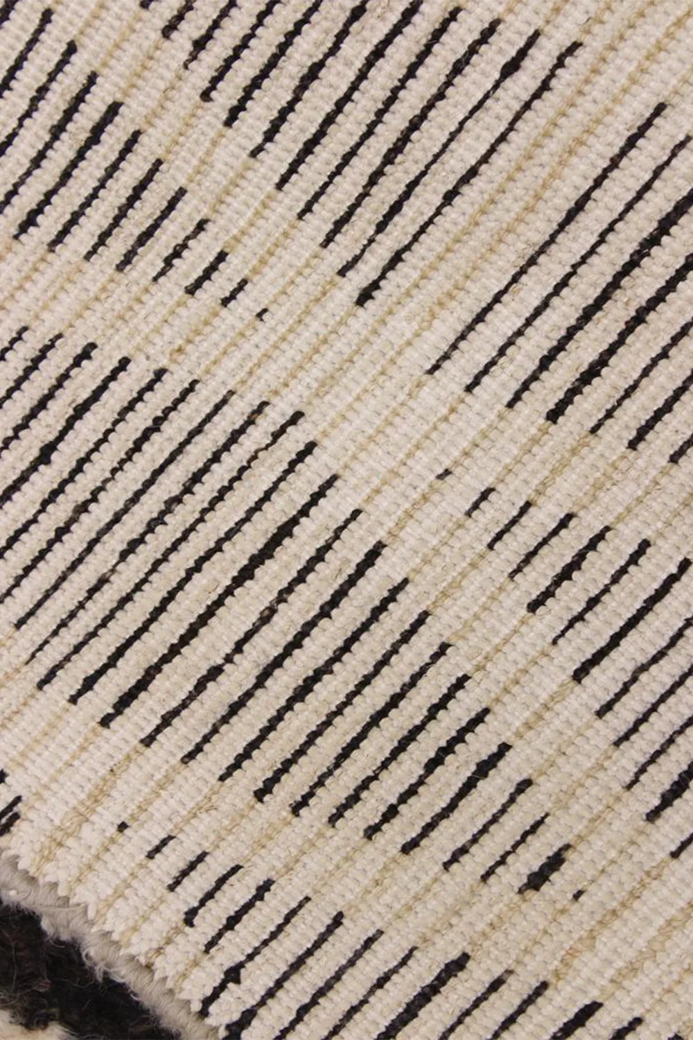 Artisan-crafted shag carpet in black and white, perfect for contemporary homes.