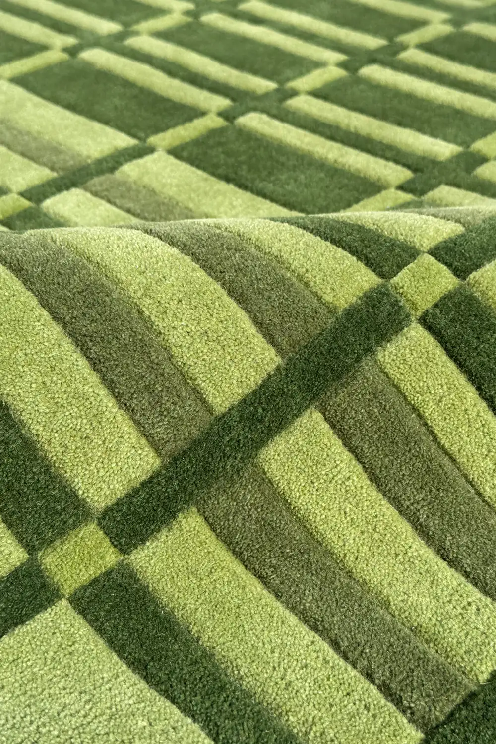 modern olive green checkered rug pattern in hand tufted wool