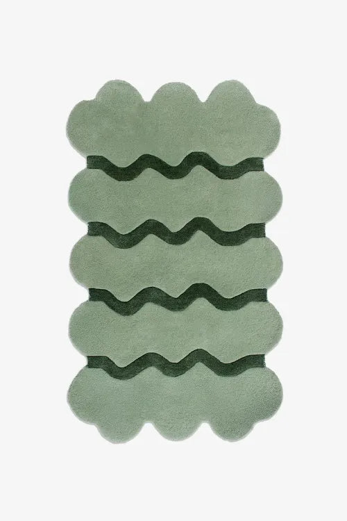 Green rug with wavy pattern on a white background